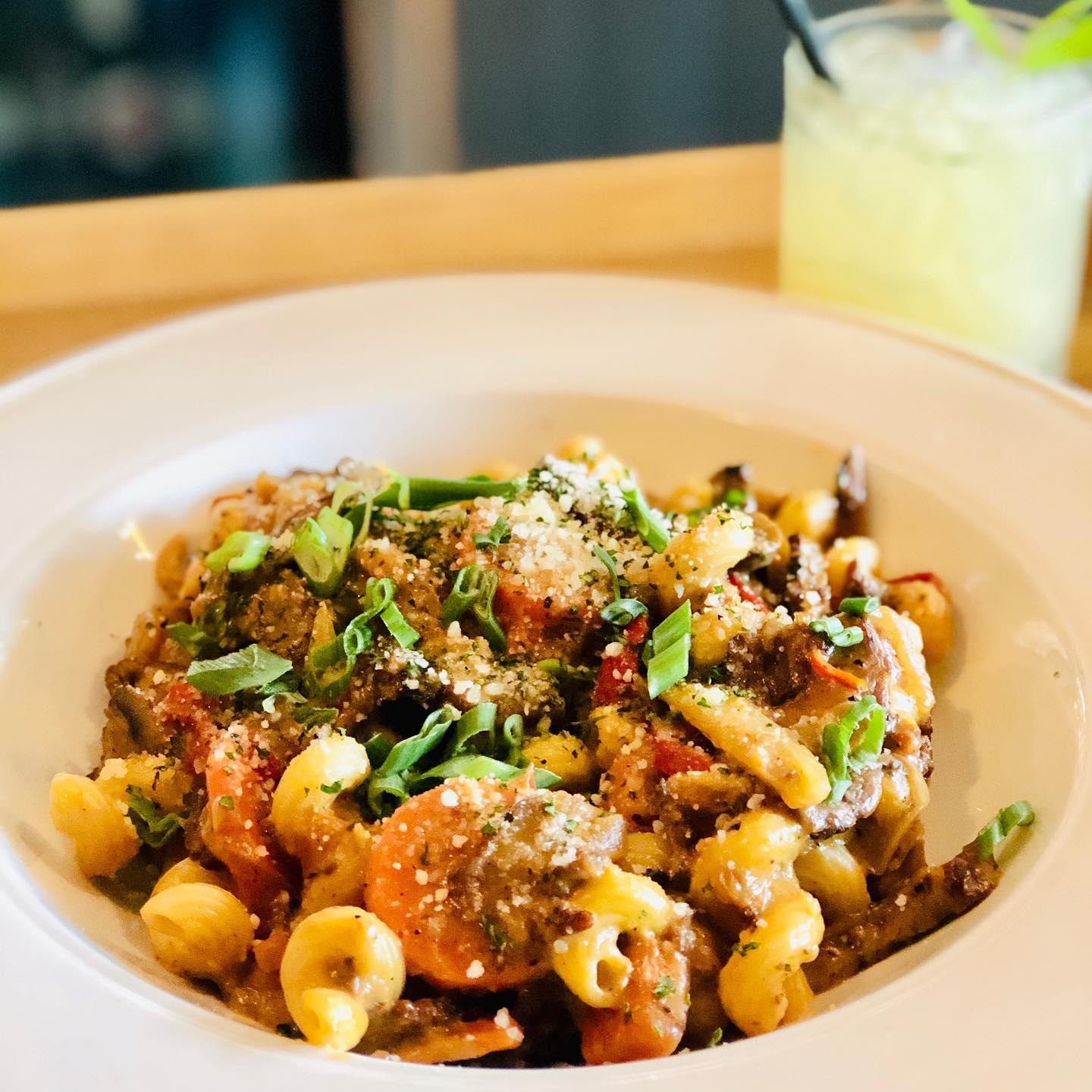 Blackened Cajun Beef Stroganoff with caramelized red bell peppers & onion, carrots, and mushroom from didisdowntown in Frisco.