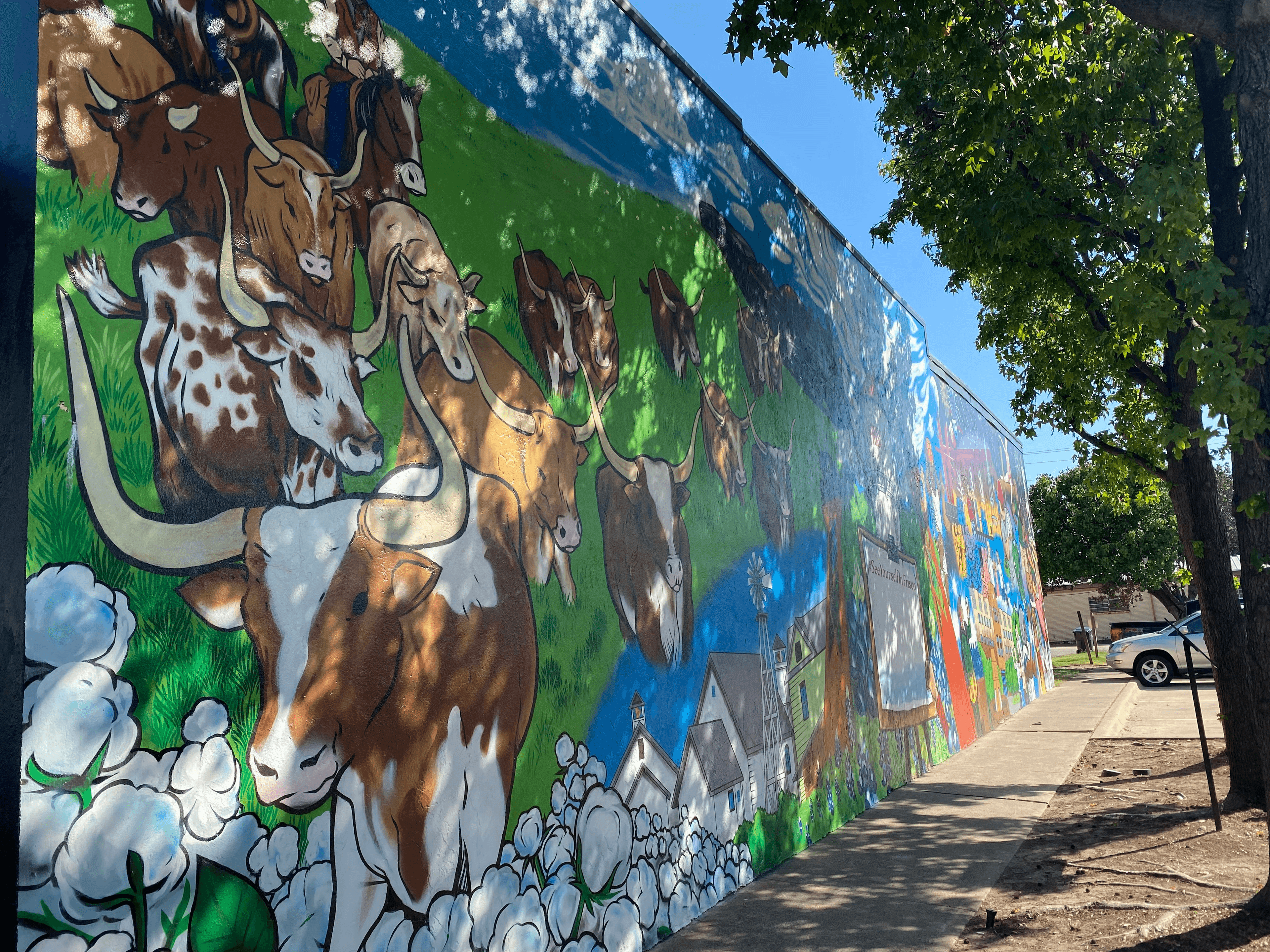 Mural of cows in a field