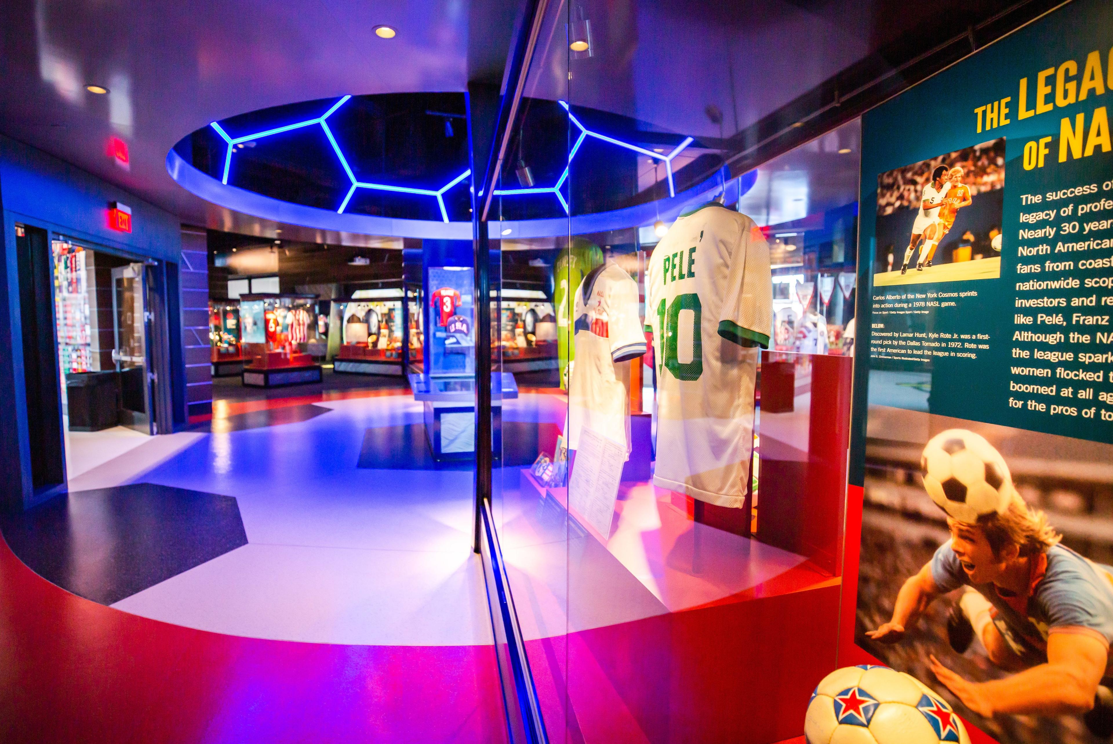 various display cases of soccer memorabilia