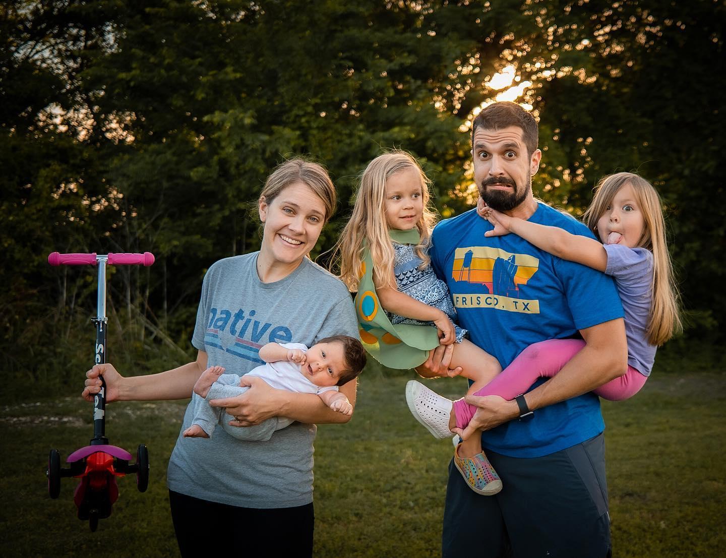 A family poses for a photo wearing TexStyles t-shirts.