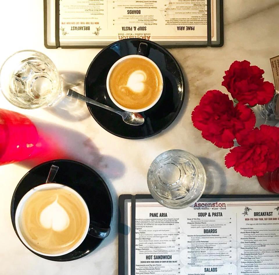 two lattes with heart latte art