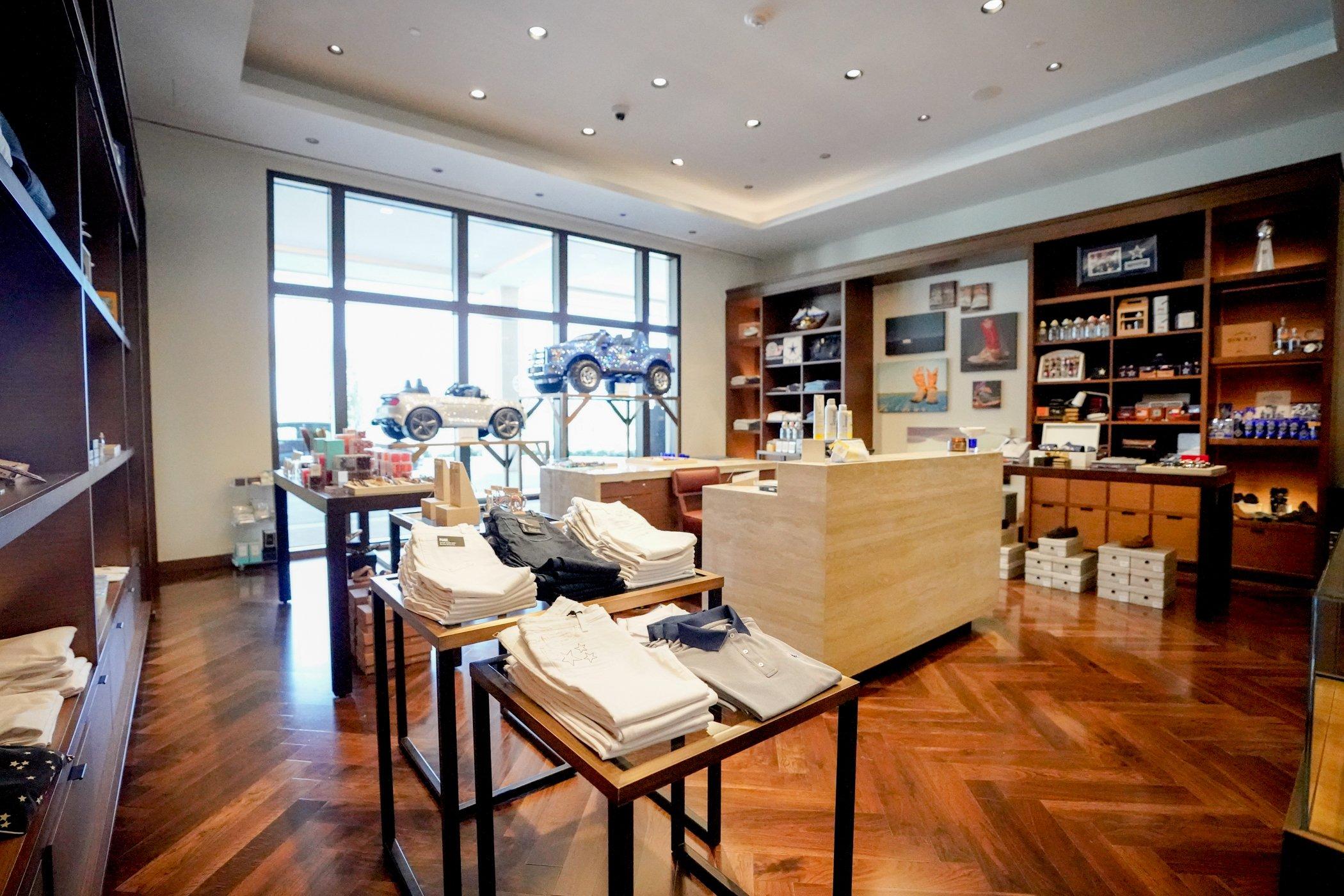 The inside of a small shop with various displays showcasing the stores products