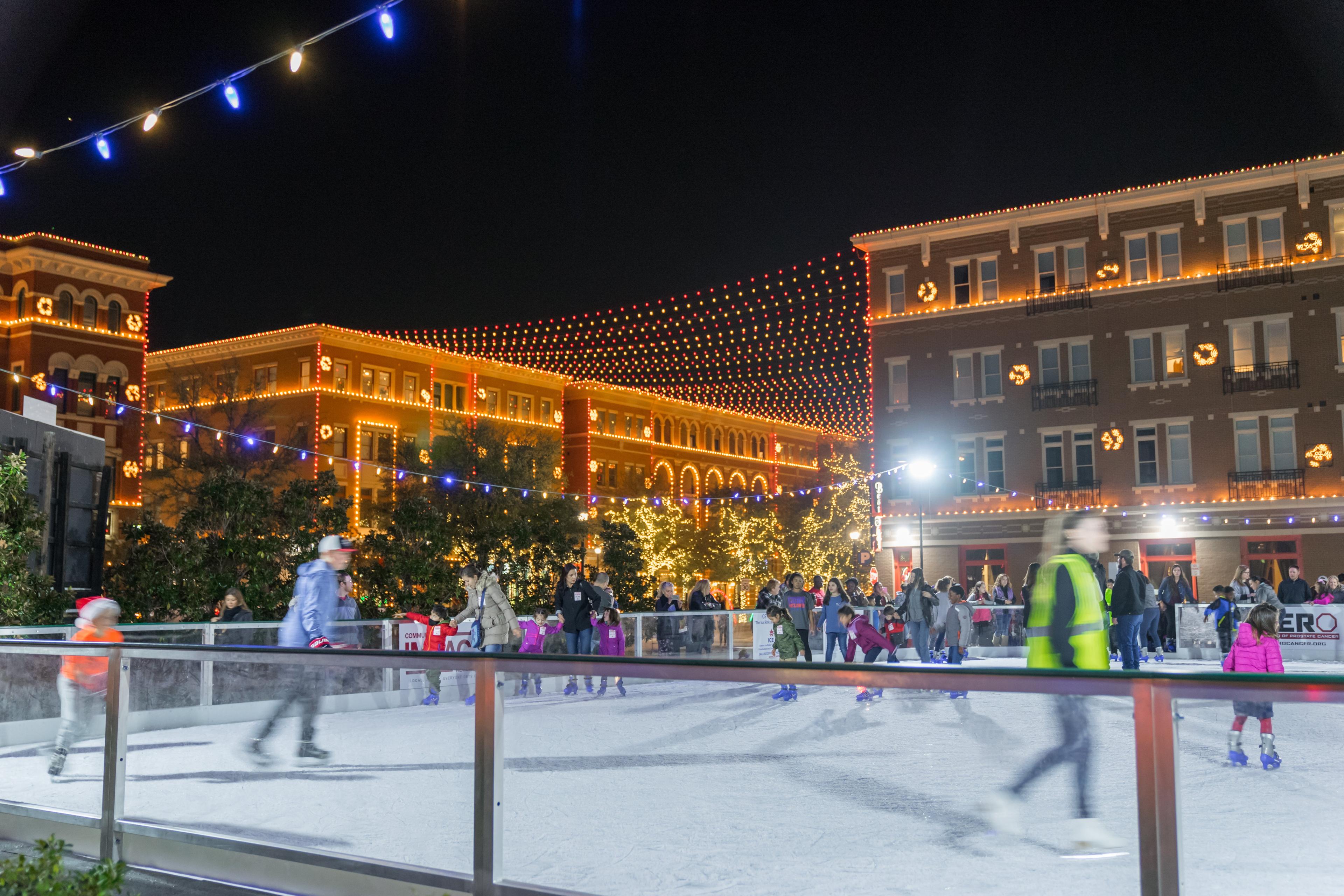 Families skating on an outdoor rink