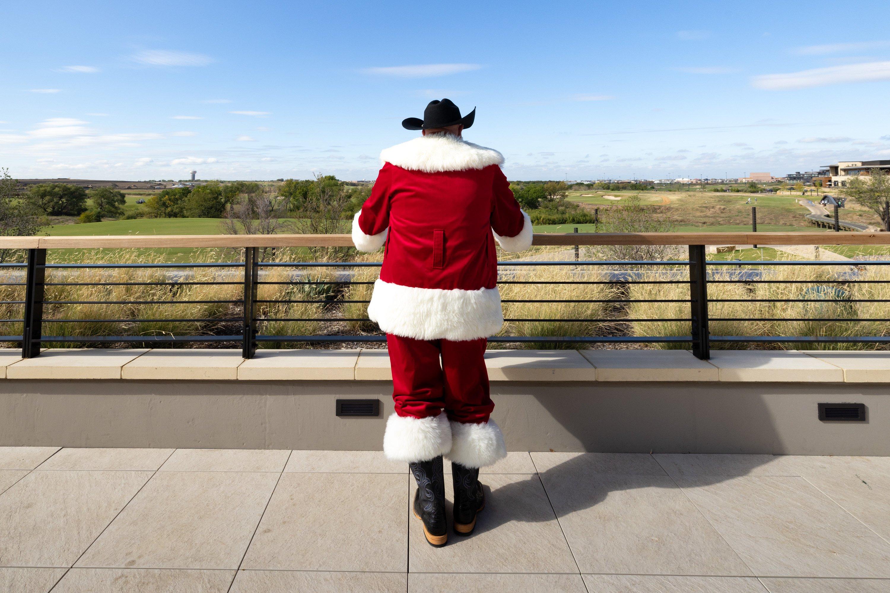 Cowboy Santa starring out to the golf greens