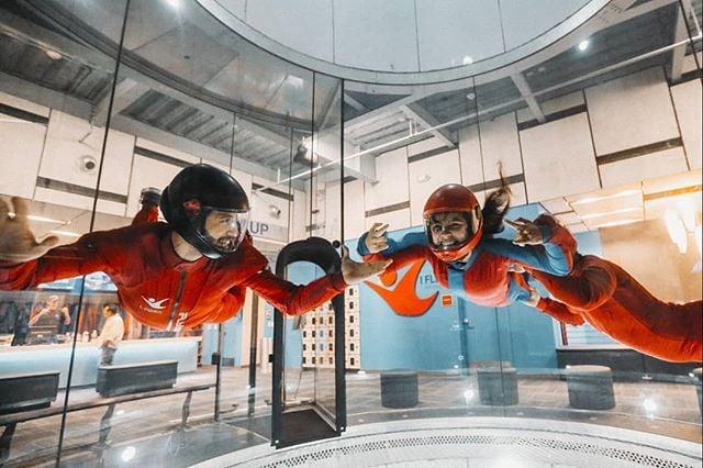 A man and a girl using the no gravity machine