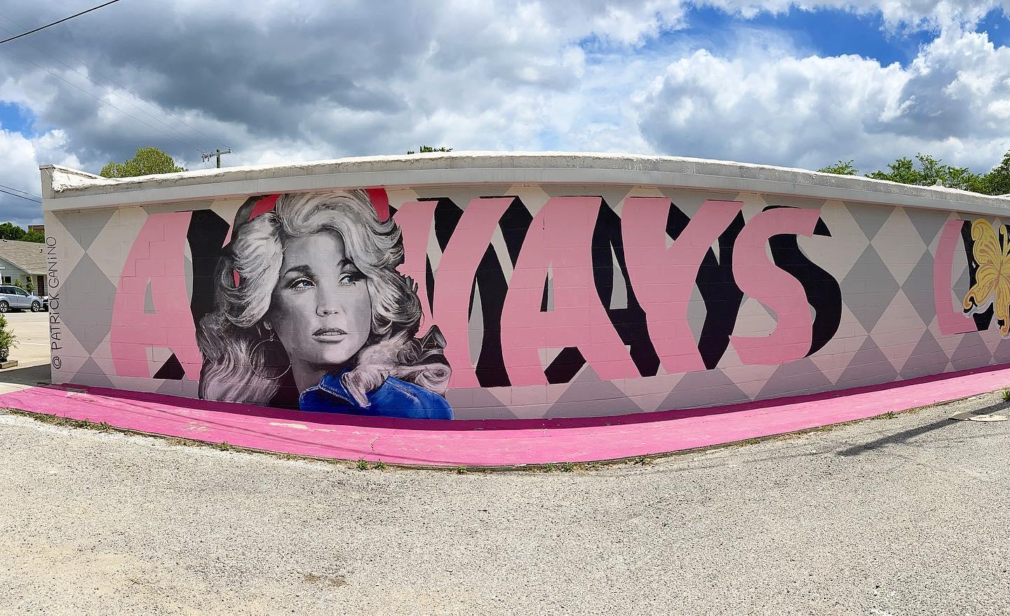 mural of a woman with the word "Always" behind her
