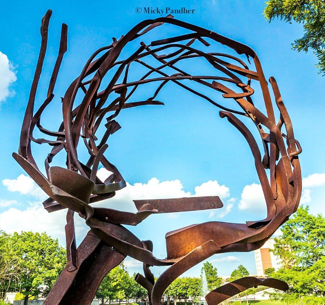 a sculpture in a park