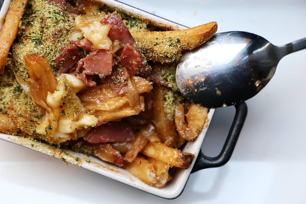 A baked fries, bacon and cheese dish from City Works in Frisco.