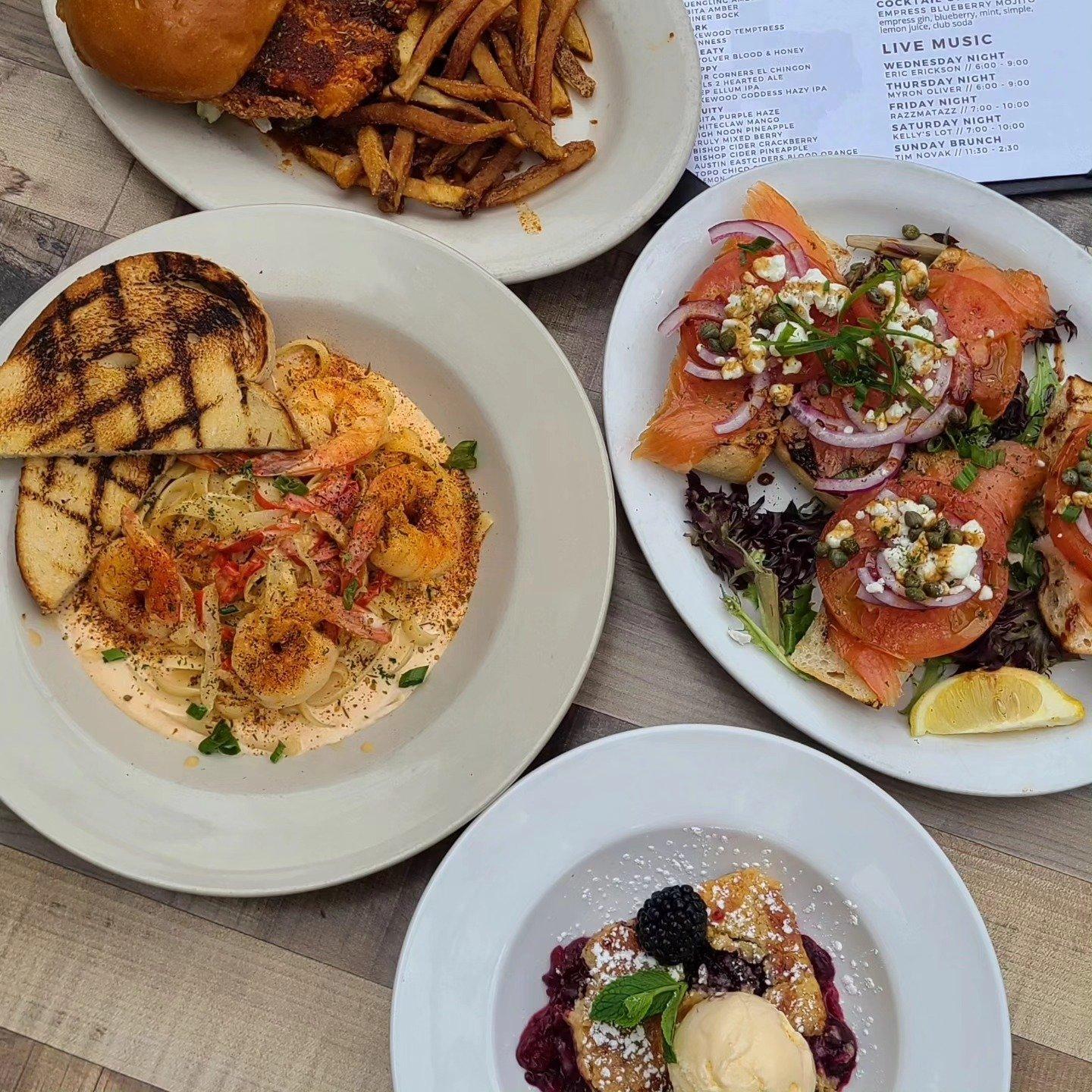 A spread of various dishes from Didi's Downtown in Frisco, including pasta, smoked salmon and desserts.